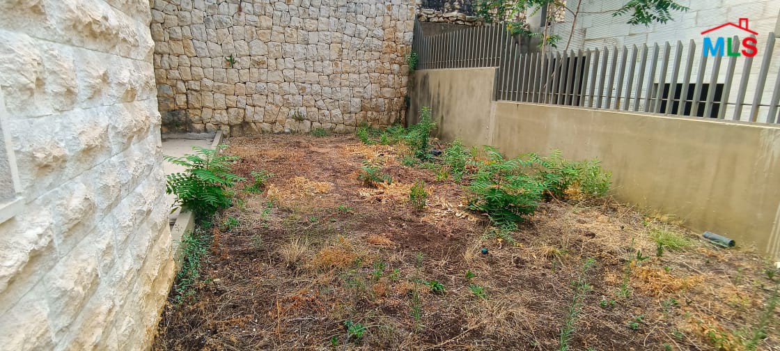 Spacious Apartment with Garden for Sale in Kfarhbeib