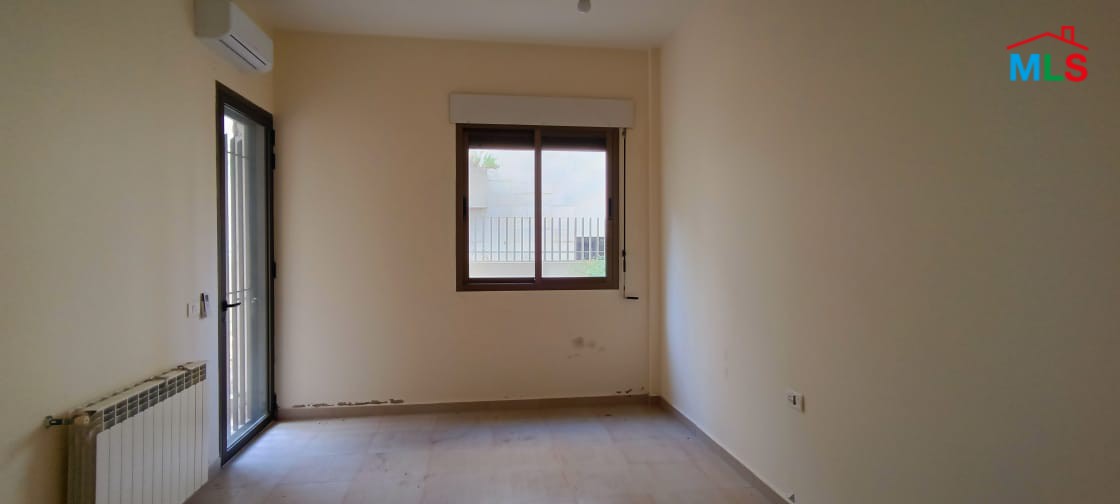 Spacious Apartment with Garden for Sale in Kfarhbeib
