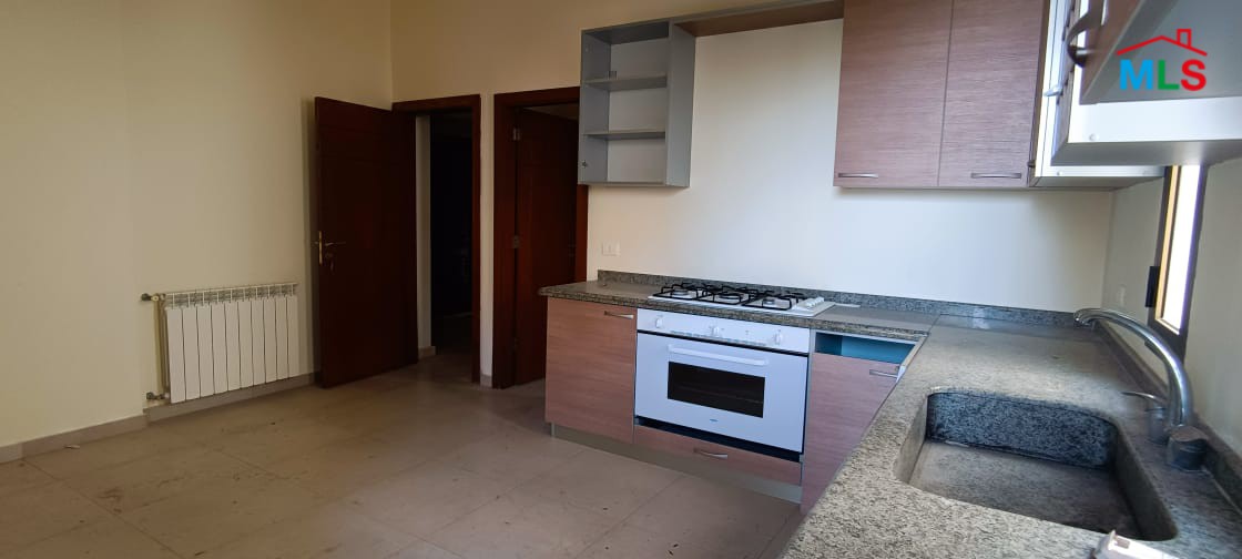 Spacious Apartment with Garden for Sale in Kfarhbeib