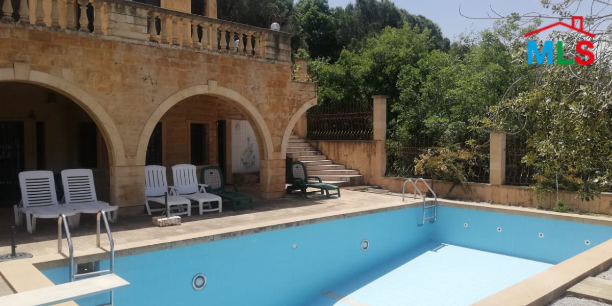 Unique & High-End Villa With Stunning View for Sale In Qornet El Hamra