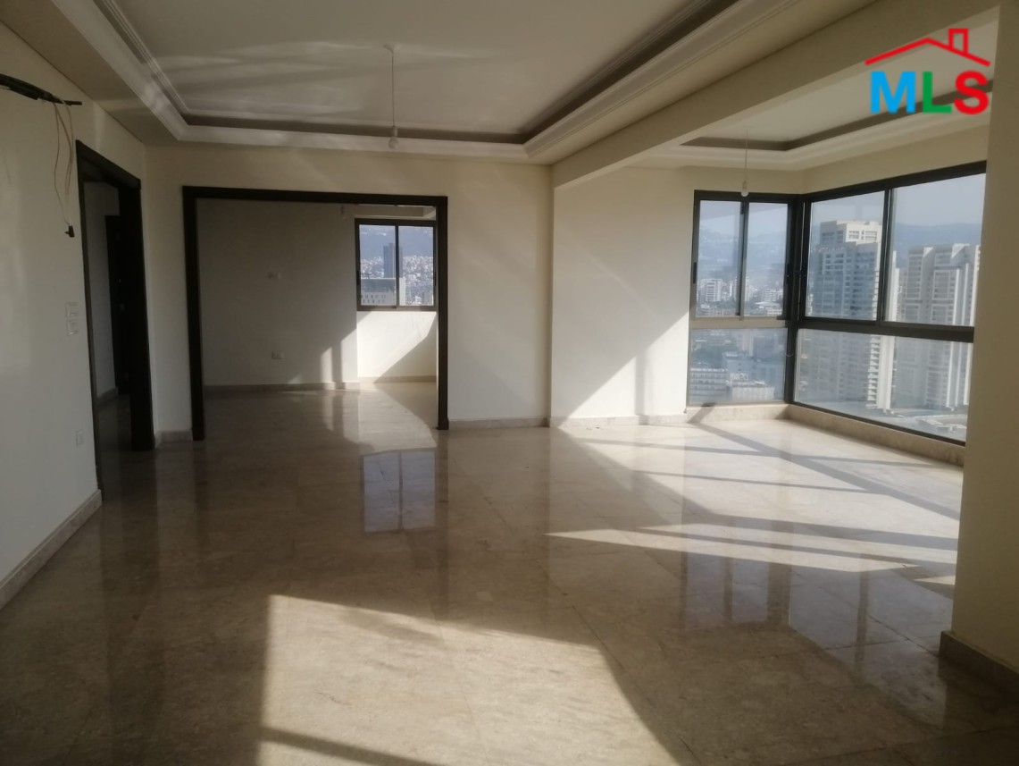 Luminous Apartment with Roof Terrace For Sale in Sioufi, Achrafieh