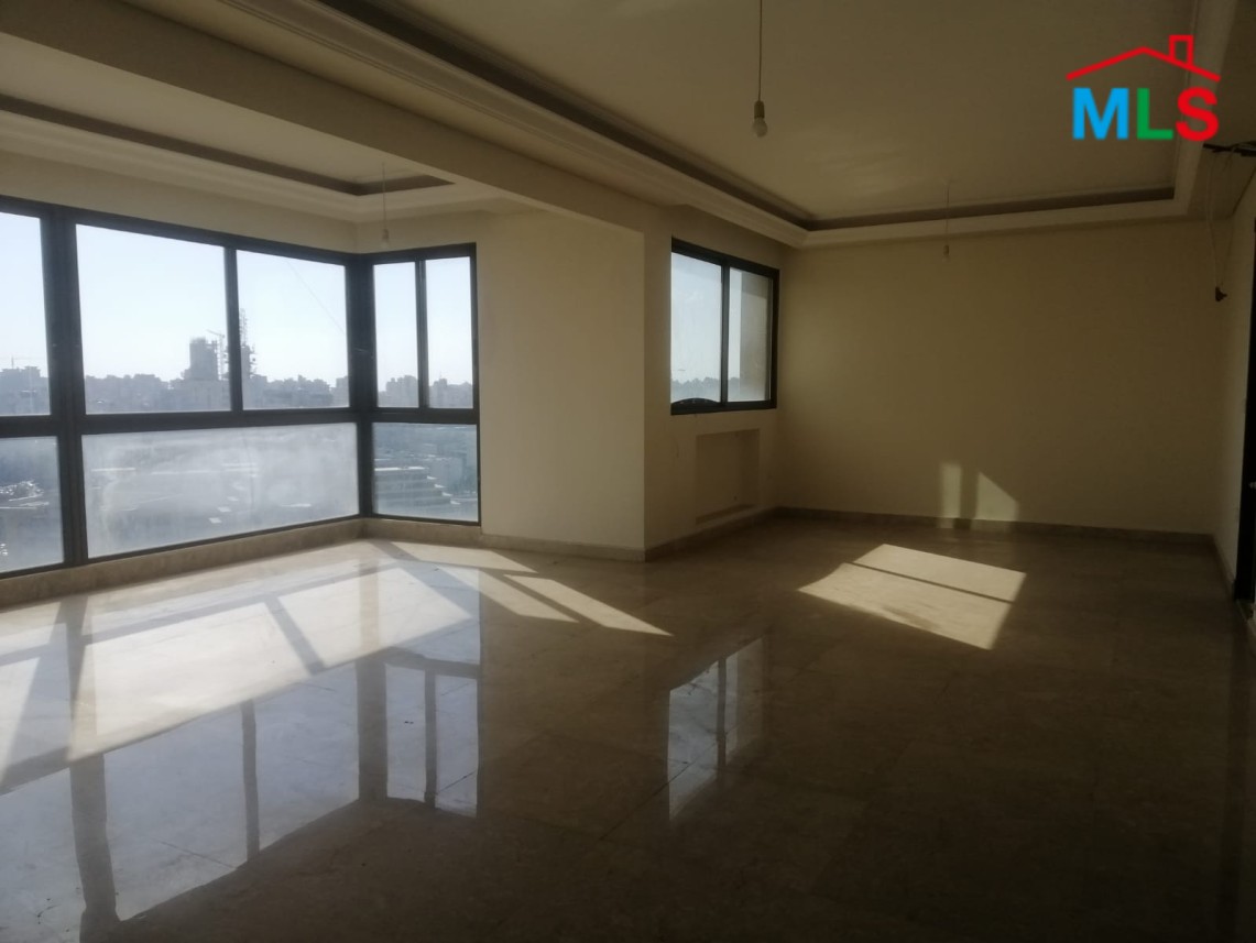Luminous Apartment with Roof Terrace For Sale in Sioufi, Achrafieh