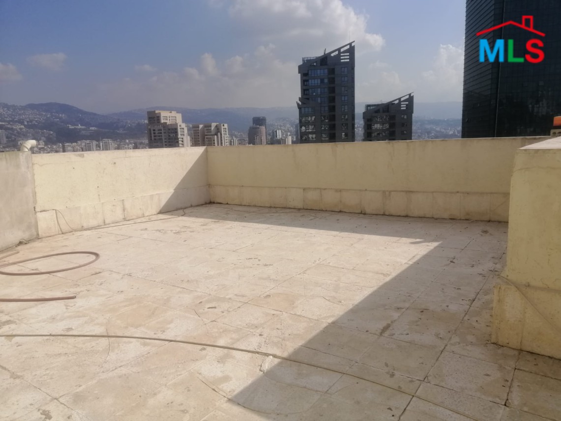 Luminous Apartment with Roof Terrace For Sale in Sioufi, Achrafieh