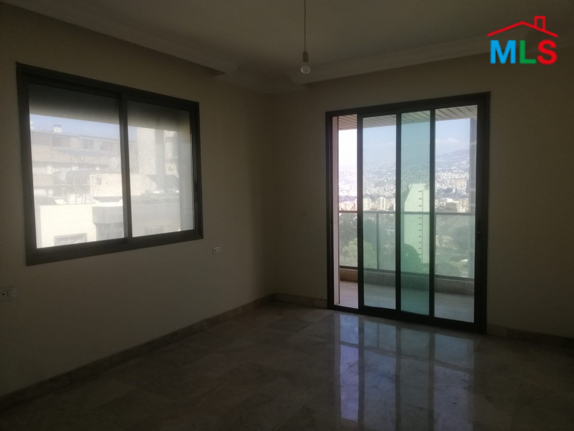 Luminous Apartment with Roof Terrace For Sale in Sioufi, Achrafieh