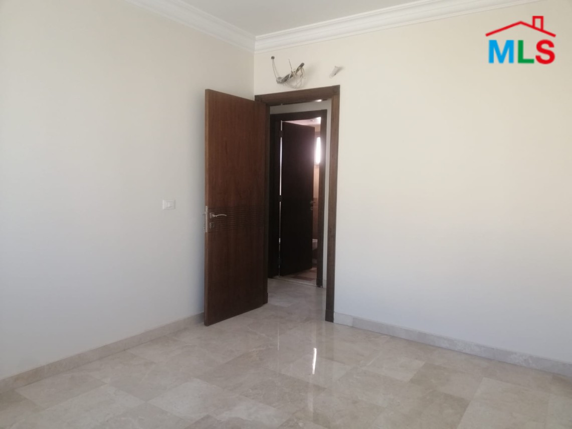 Luminous Apartment with Roof Terrace For Sale in Sioufi, Achrafieh