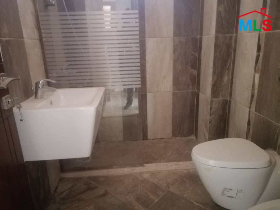 Luminous Apartment with Roof Terrace For Sale in Sioufi, Achrafieh