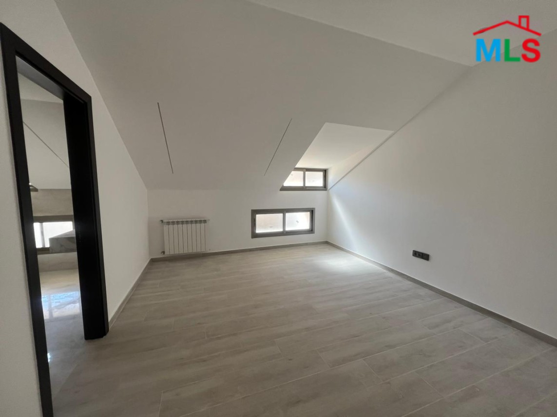 A Duplex With A Breathtaking View for Sale In Adma with A Terrace and A Garden