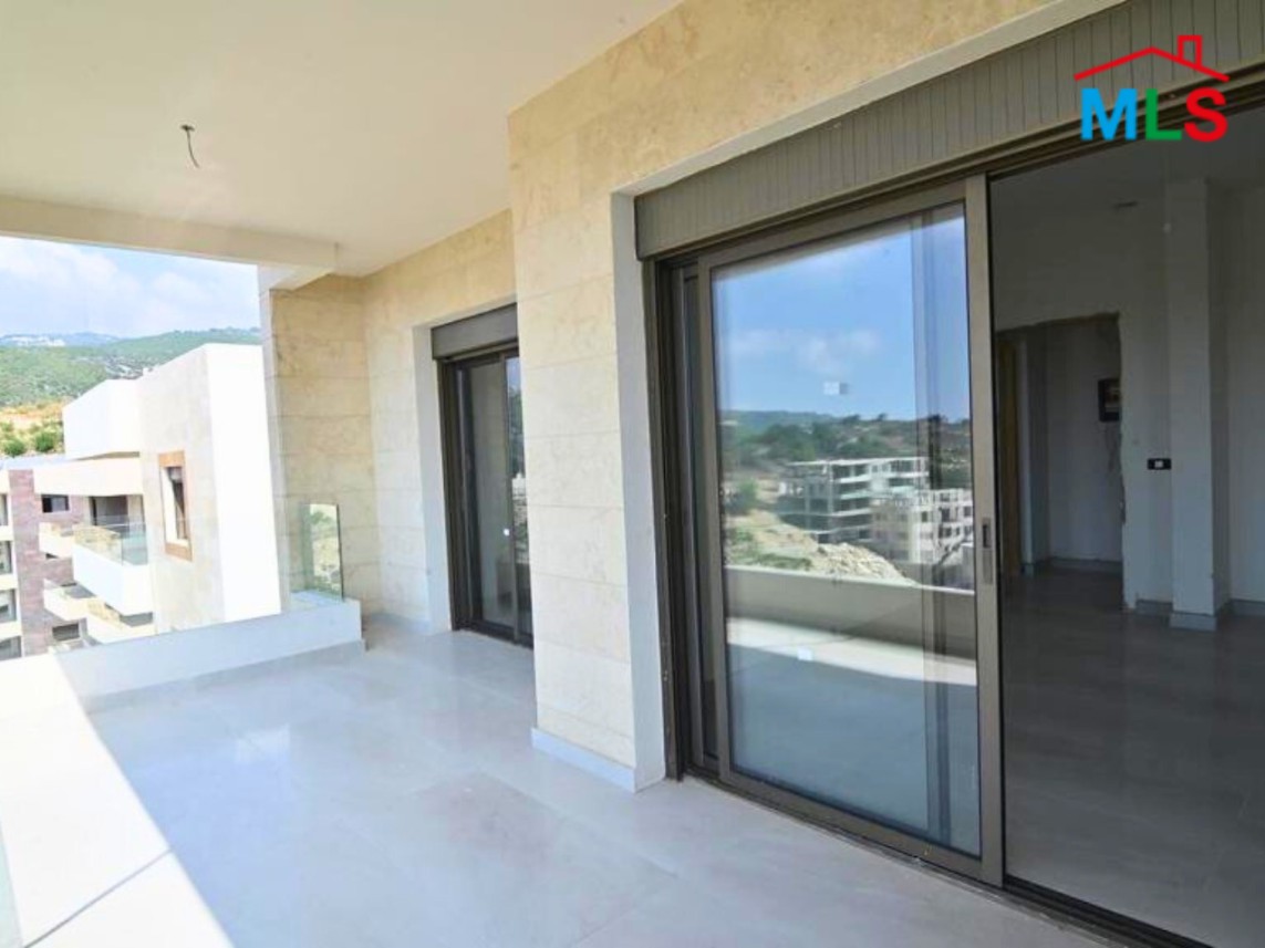 Spacious apartment for Sale in Hboub with a Stunning Sea View & a Garden