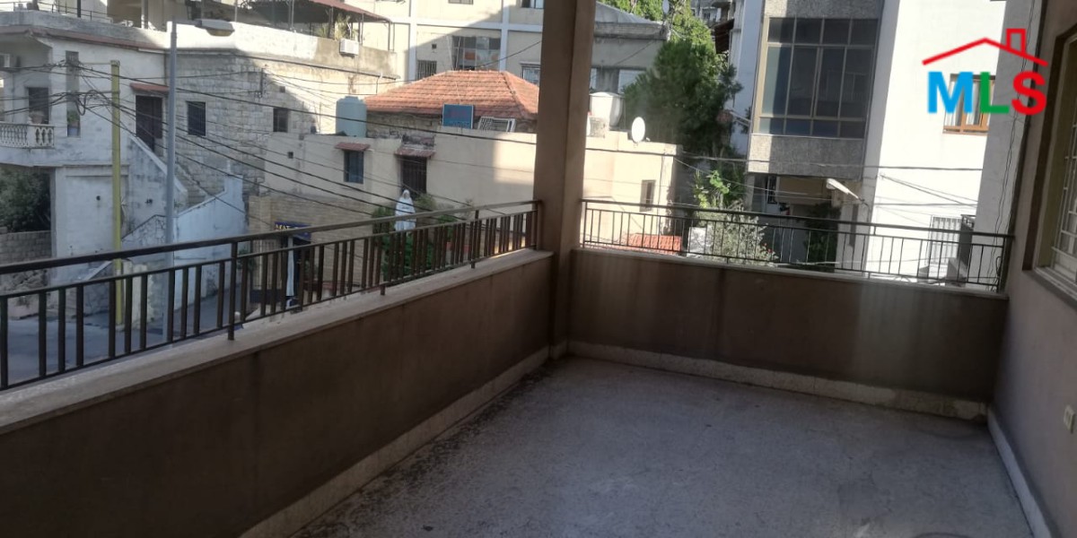 Spacious Apartment with Terrace for Sale in the Heart of Zalka