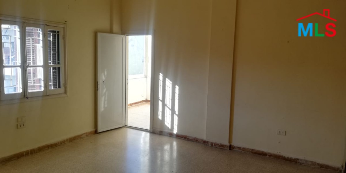 Spacious Apartment with Terrace for Sale in the Heart of Zalka