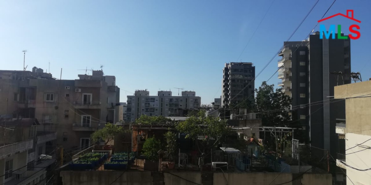 Spacious Apartment with Terrace for Sale in the Heart of Zalka