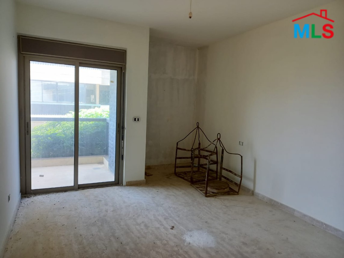 Nicely Located Apartment for Sale in Haret Sakher with a Small Terrace