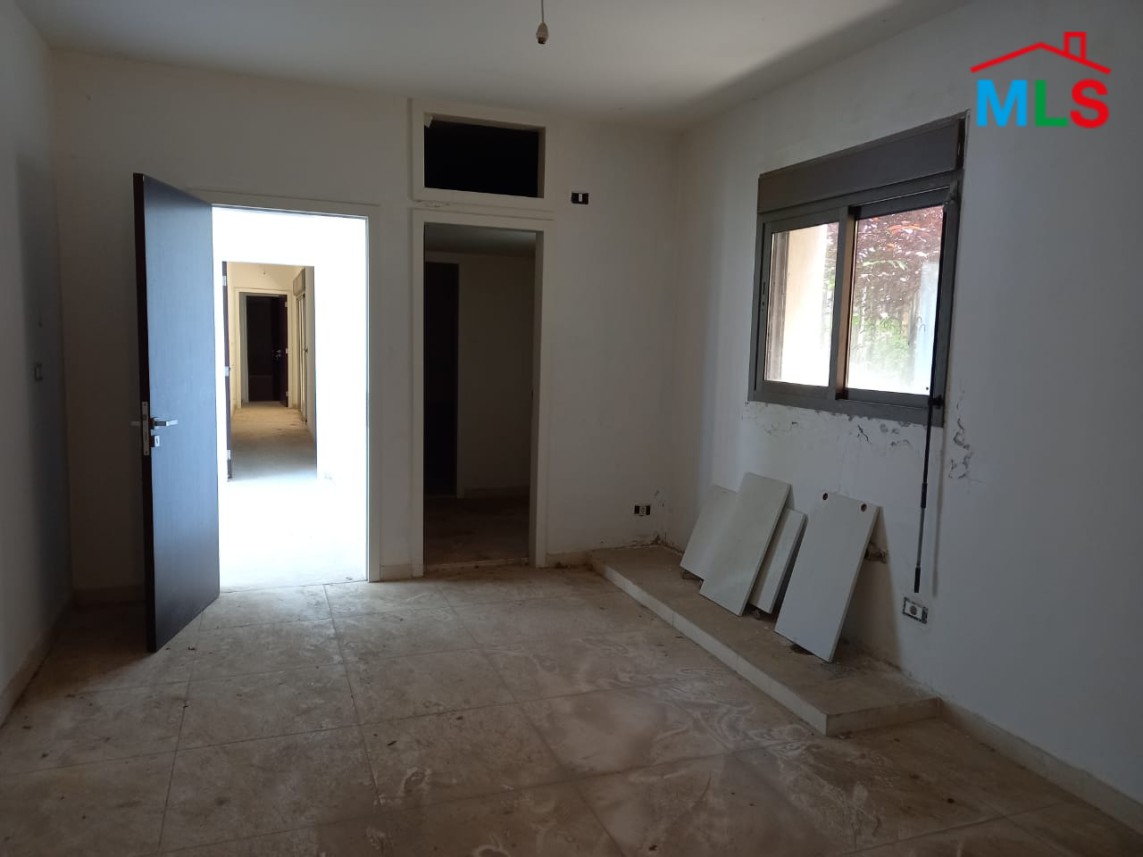 A Spacious Apartment with Garden for Sale in Haret Sakher