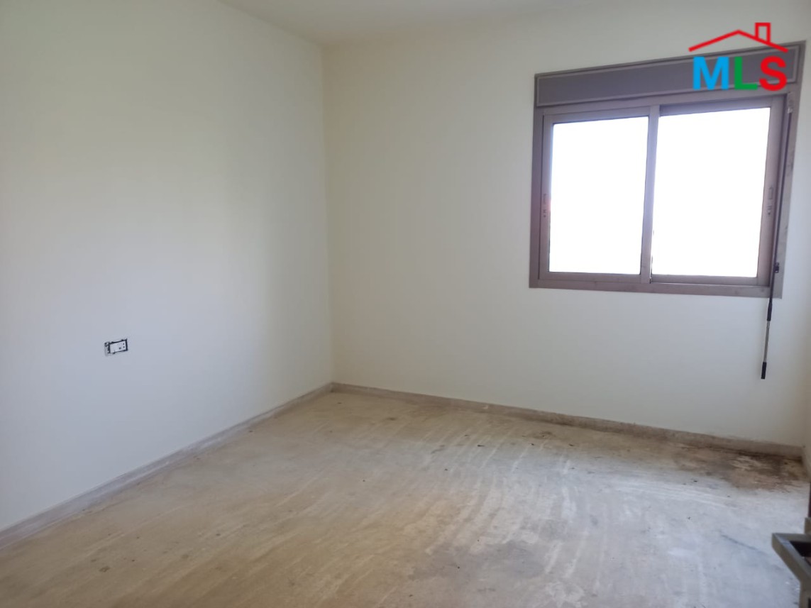 A Spacious Apartment with Garden for Sale in Haret Sakher