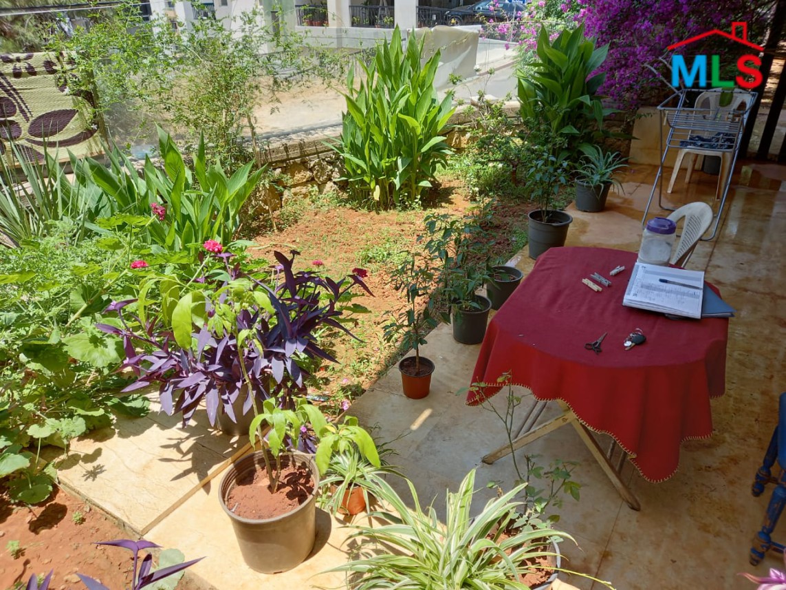 A Spacious Apartment with Garden for Sale in Haret Sakher