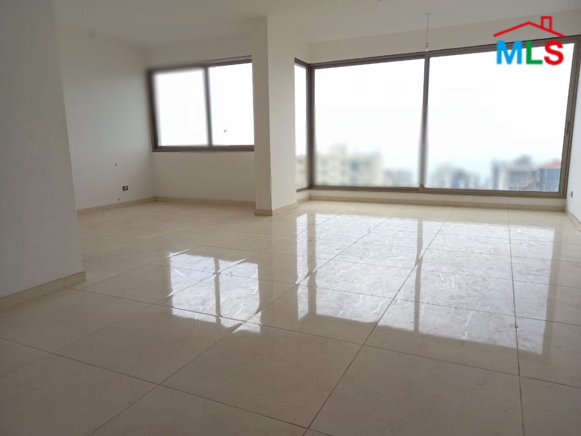 An Amazing Apartment with Open Sea View for Sale in Haret Sakher
