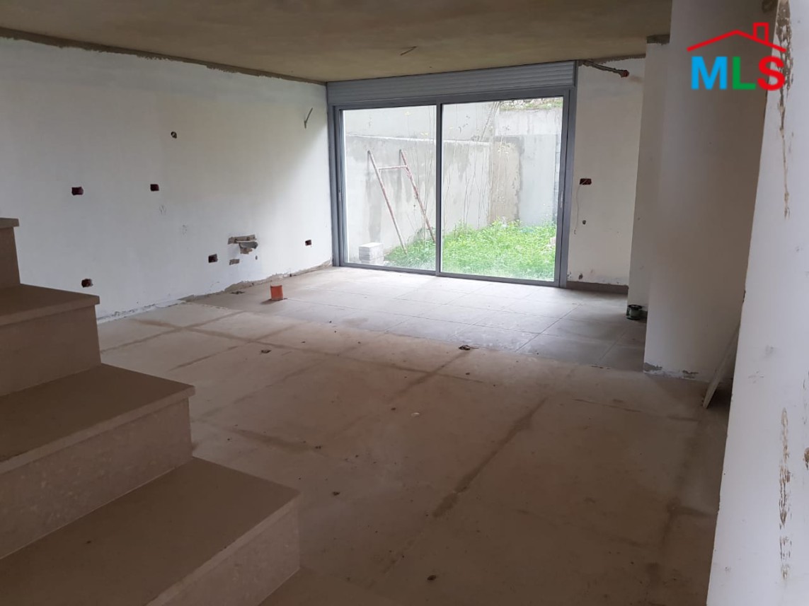 An Amazing Duplex with a Garden and Sea View for Sale in Sahel Alma