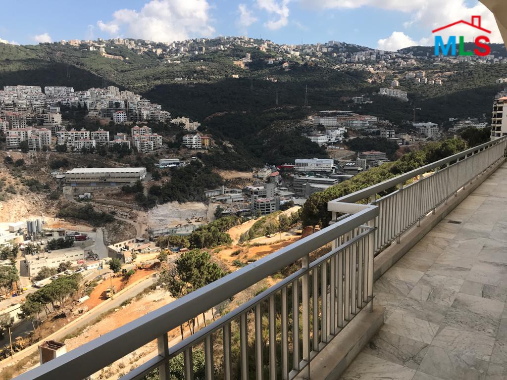 Apartment for Sale in Fanar with A Terrace Overlooking a Beautiful Sea View
