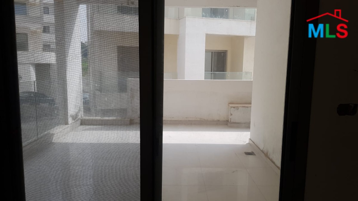 A Cozy Apartment for Sale in Tabarja with Shared Pool