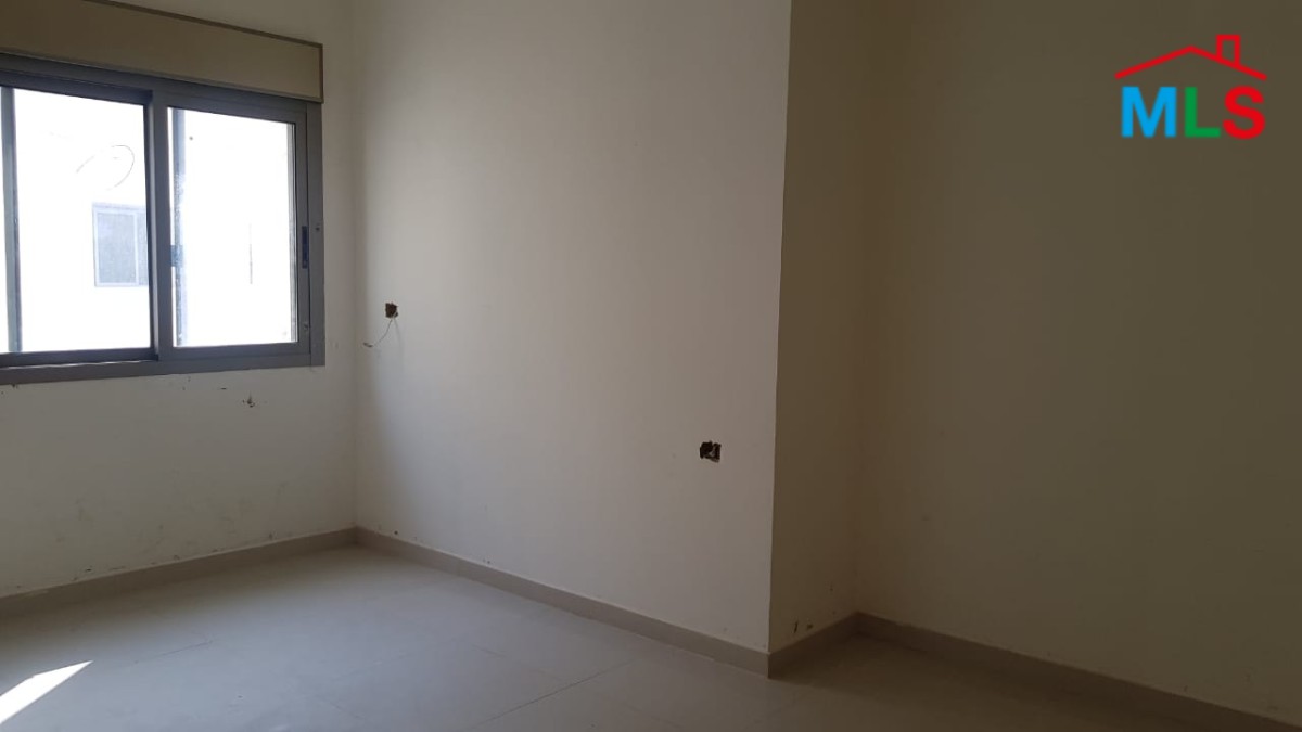 A Cozy Apartment for Sale in Tabarja with Shared Pool