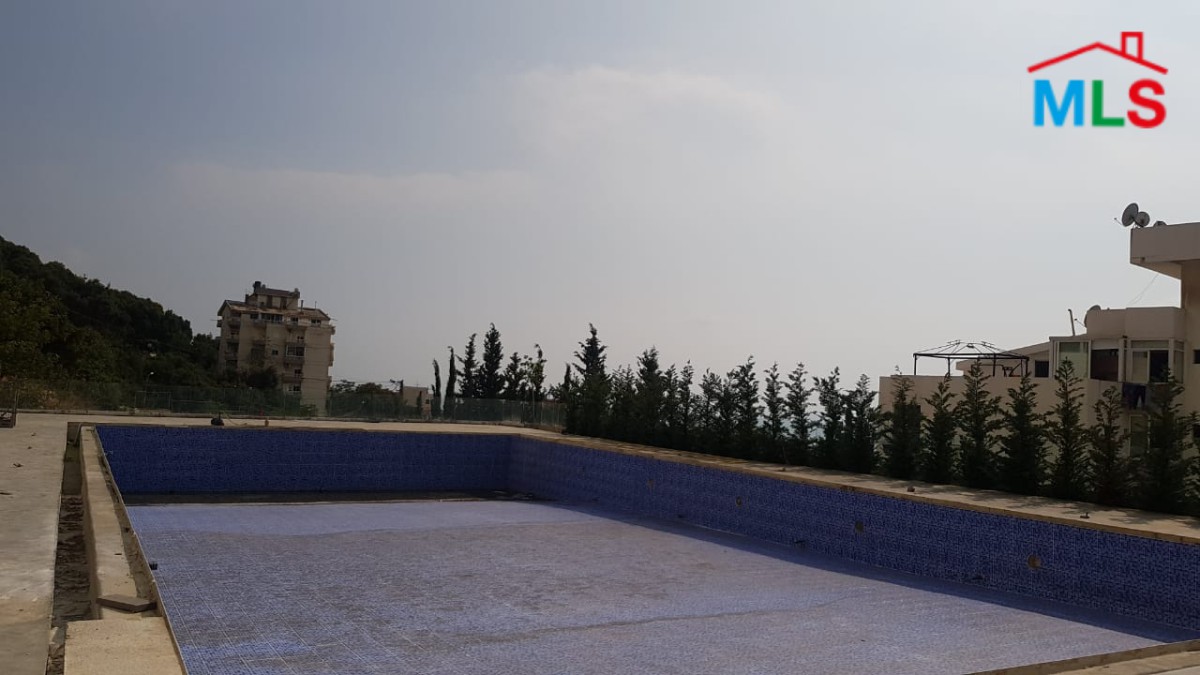 A Cozy Apartment for Sale in Tabarja with Shared Pool