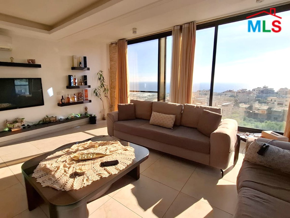 Apartment for Sale in Aamchit Benefits From An Open Sea View