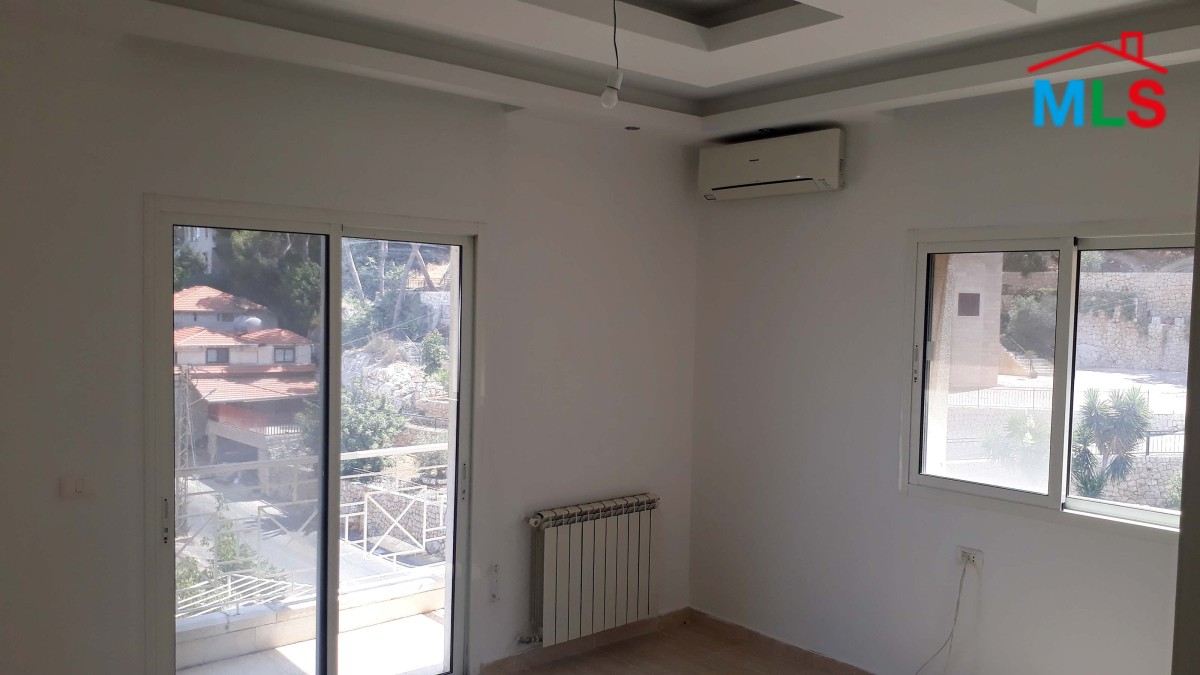 Spacious Apartment For Sale in Qornet El Hamra with a nice view