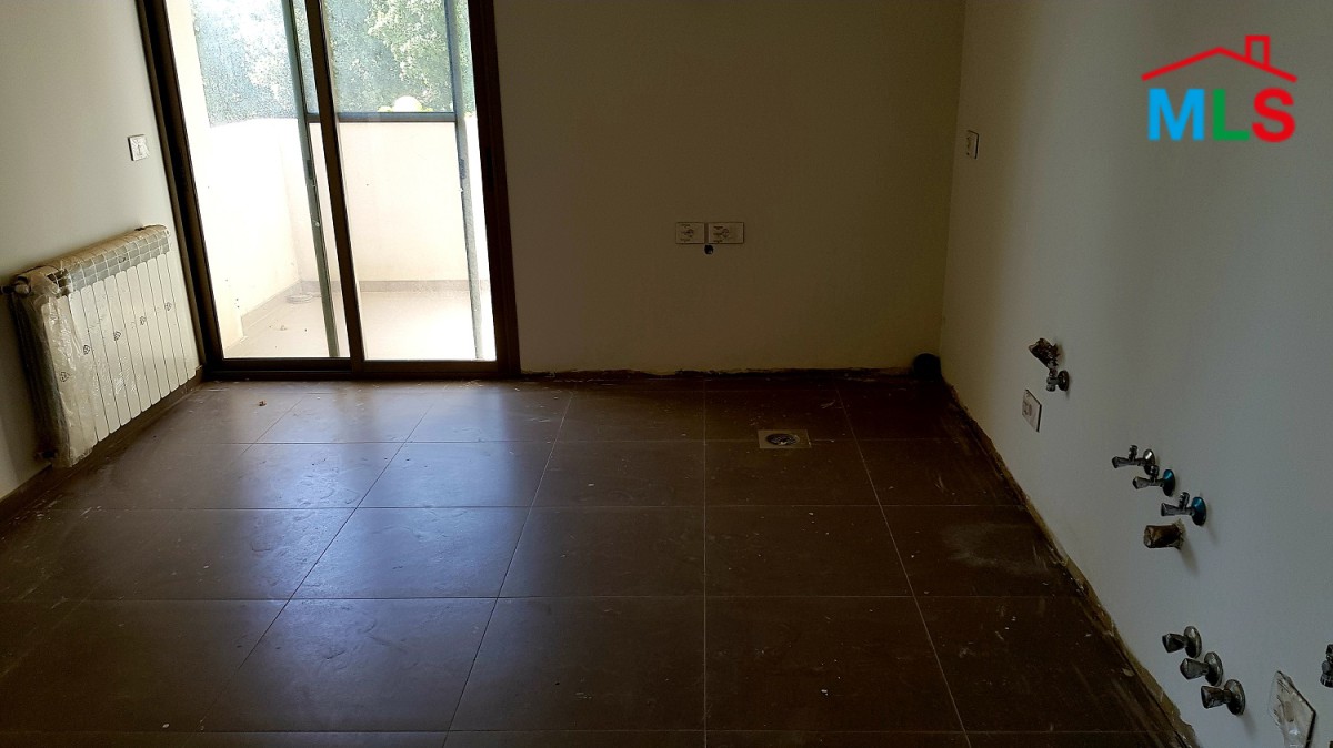 Brand New High-End Apartment For Sale In Ain Al Rihani with 50 sqm garden