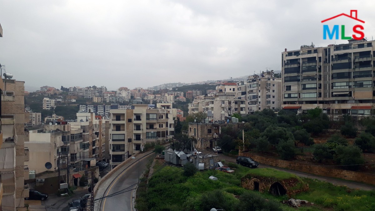 Hot Deal !! Large Apartment For Sale in Beit Chaar with a Nice View