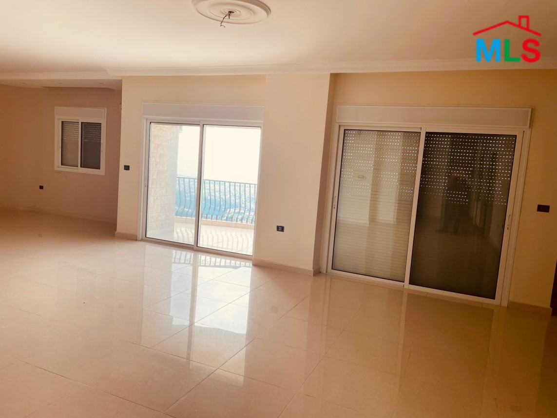 Apartment For Sale in Halat With An Open Sea View