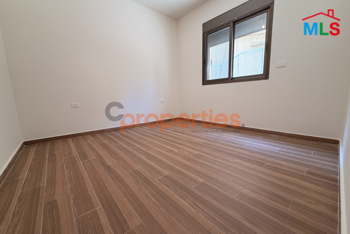 Apartment with Terrace For Sale in Naccache – CPLO26