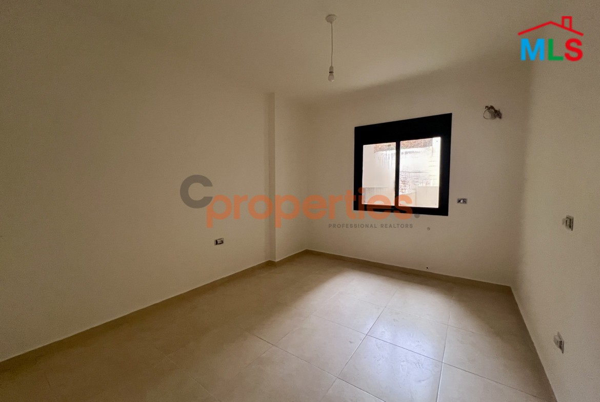 Spacious Apartment With Partial Sea View For Sale In Mar Roukoz | CPCC126