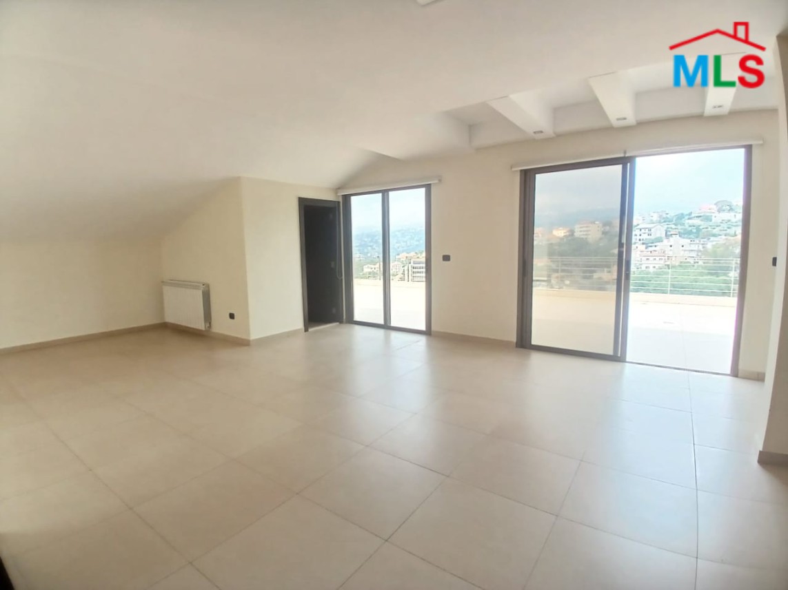 Unfurnished Roof Apartment With a Nice View For Rent in Qornet El Hamra