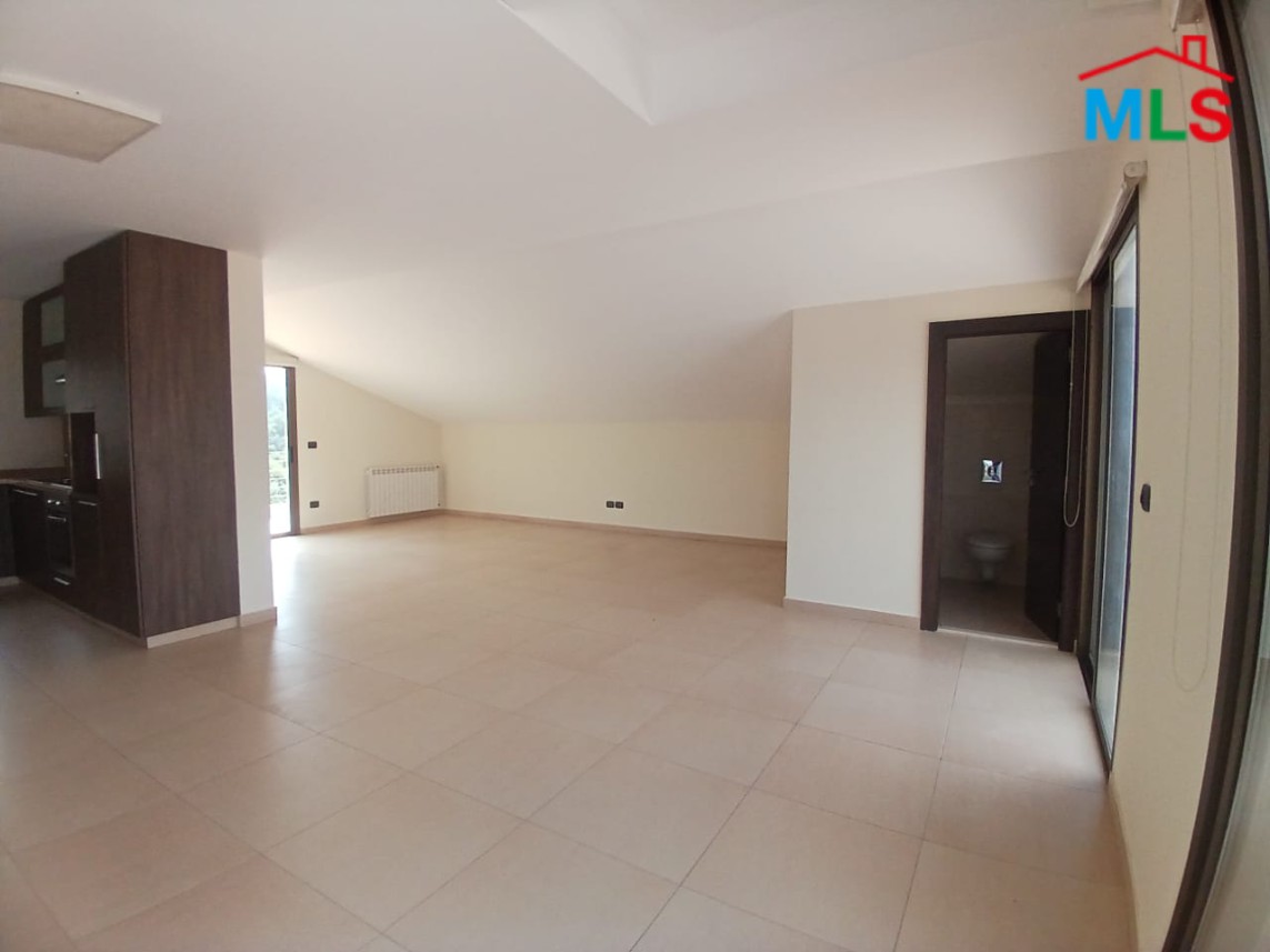 Unfurnished Roof Apartment With a Nice View For Rent in Qornet El Hamra