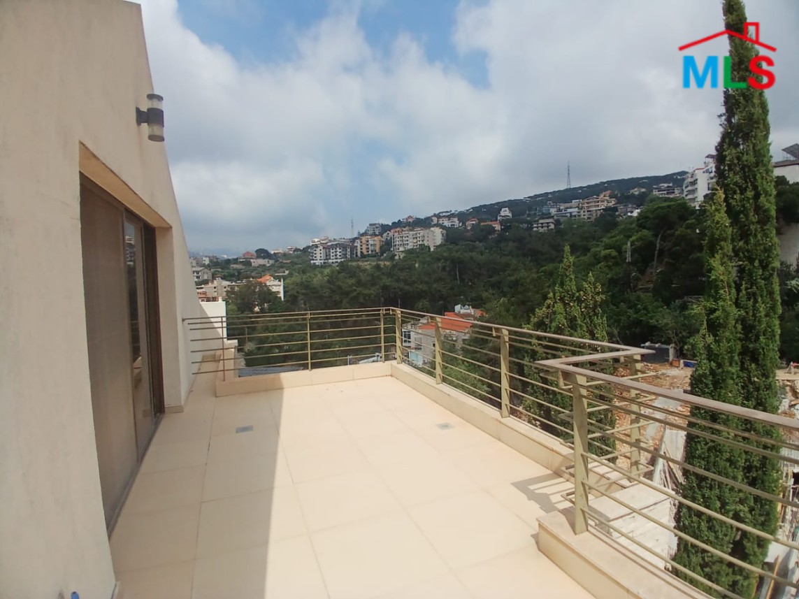 Unfurnished Roof Apartment With a Nice View For Rent in Qornet El Hamra
