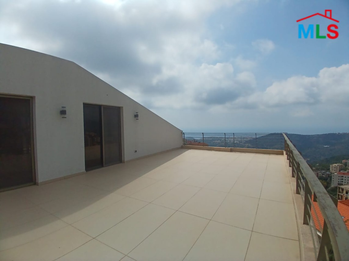 Unfurnished Roof Apartment With a Nice View For Rent in Qornet El Hamra