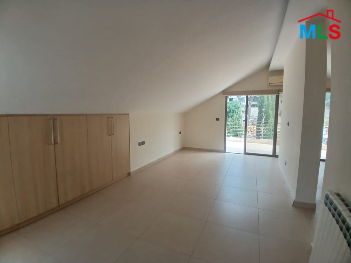 Unfurnished Roof Apartment With a Nice View For Rent in Qornet El Hamra