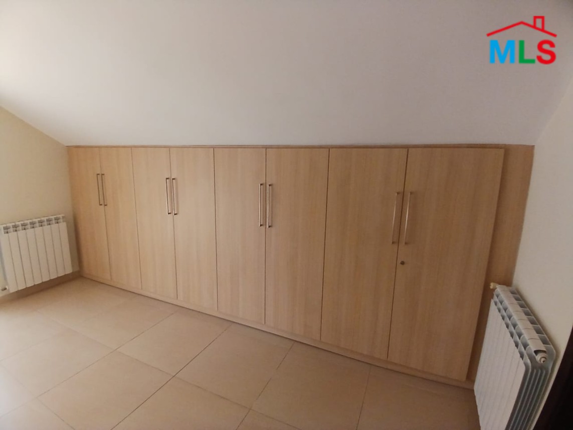 Unfurnished Roof Apartment With a Nice View For Rent in Qornet El Hamra