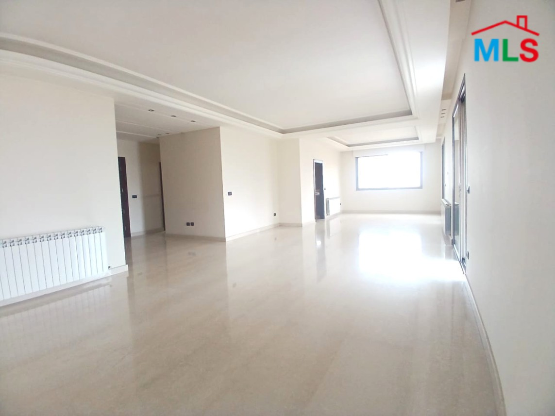 Unfurnished Apartment With a Nice View For Rent in Qornet El Hamra