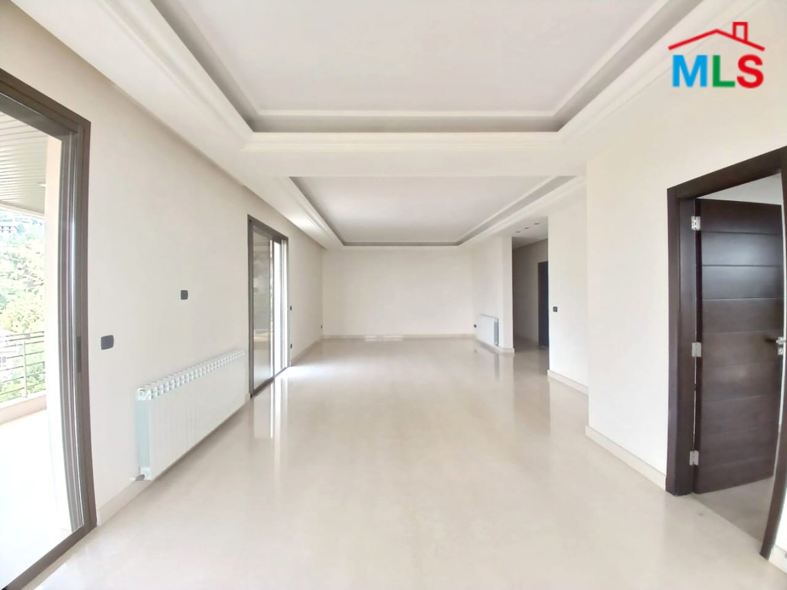 Unfurnished Apartment With a Nice View For Rent in Qornet El Hamra