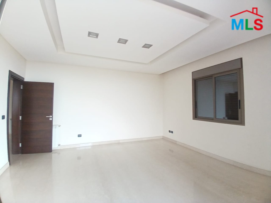 Unfurnished Apartment With a Nice View For Rent in Qornet El Hamra