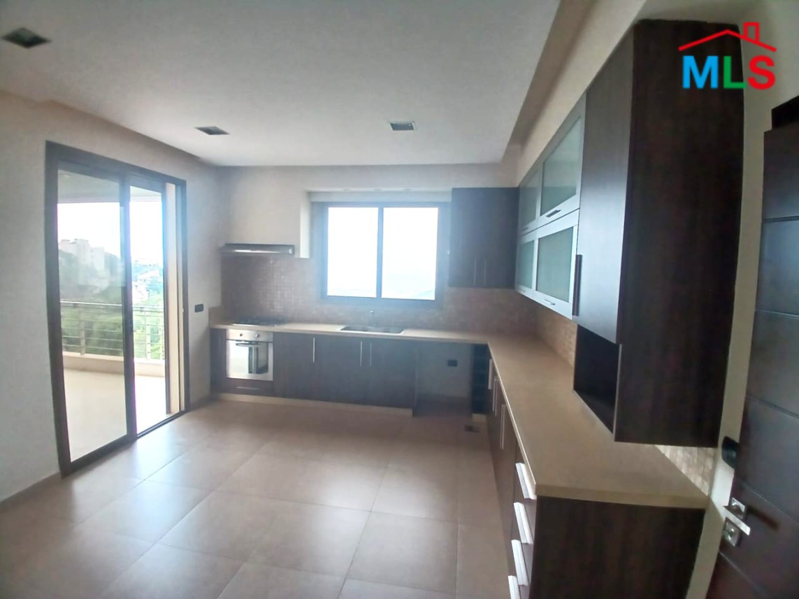 Unfurnished Apartment With a Nice View For Rent in Qornet El Hamra
