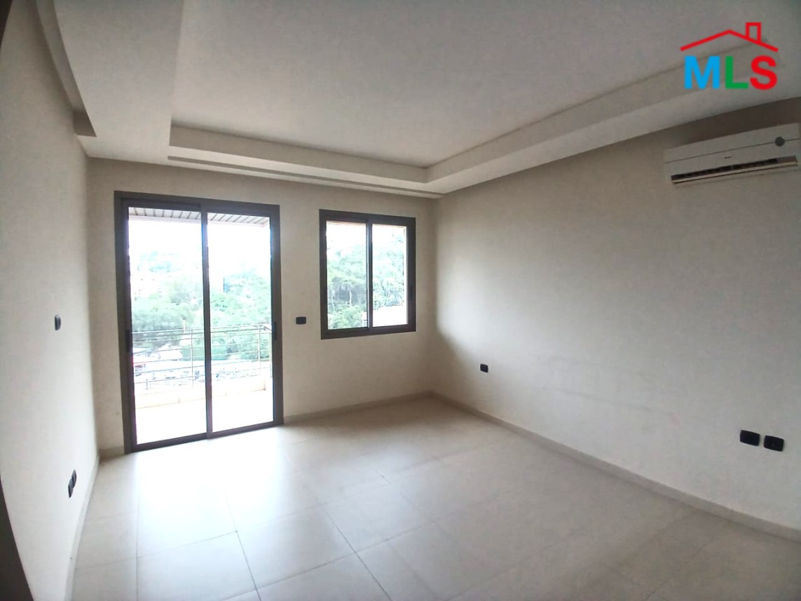 Unfurnished Apartment With a Nice View For Rent in Qornet El Hamra