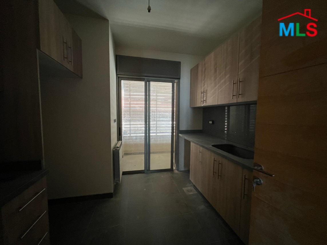 Semi-Furnished Apartment With Garden For Rent in Kfarhbeib
