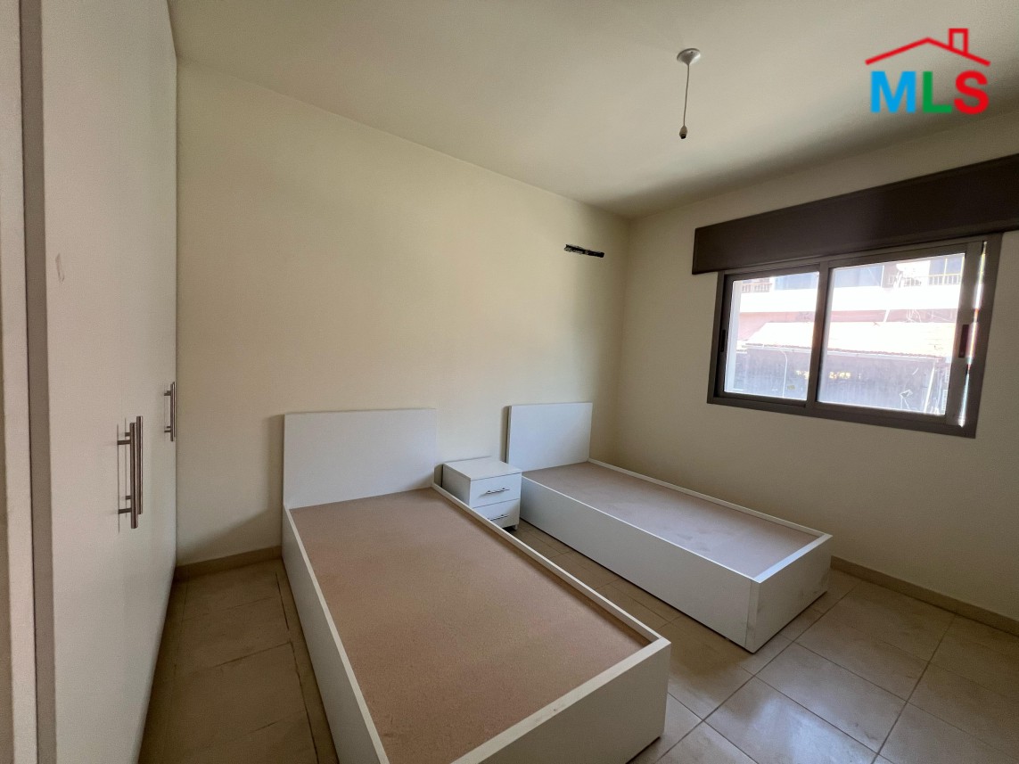 Semi-Furnished Apartment With Garden For Rent in Kfarhbeib