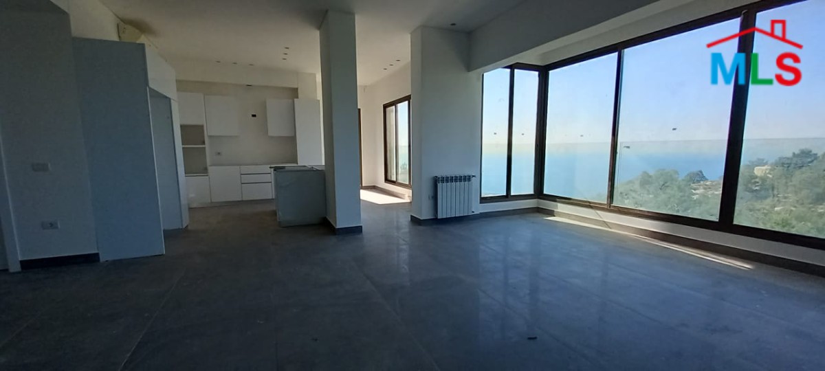 A Deluxe Apartment for Rent in Adma with Garden and Open Sea View