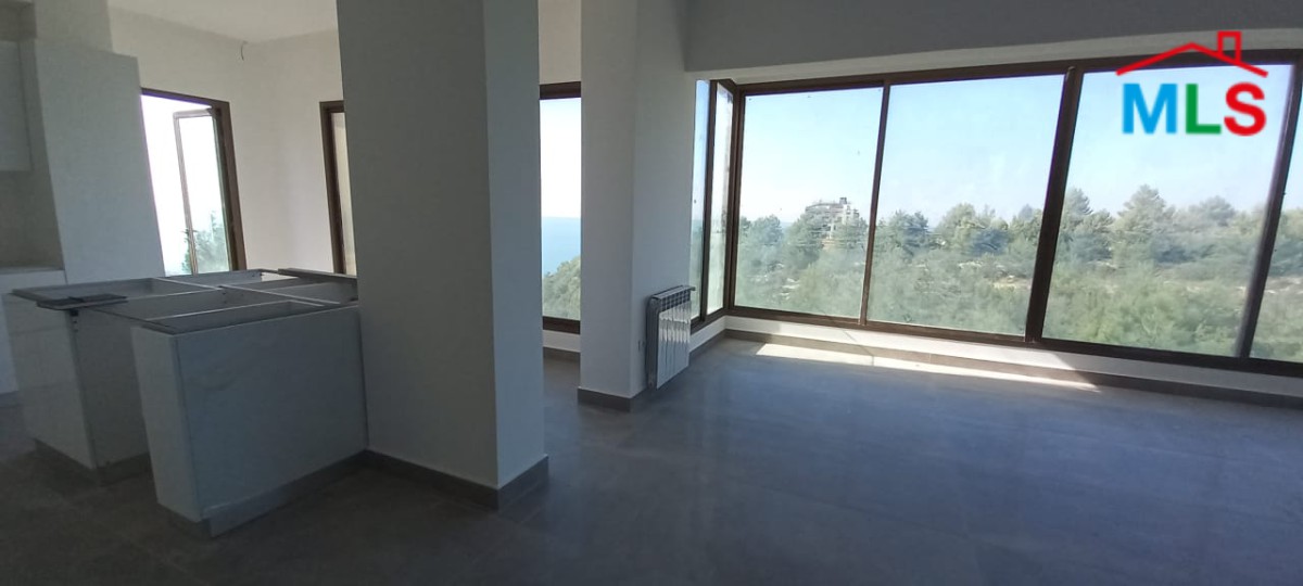 A Deluxe Apartment for Rent in Adma with Garden and Open Sea View