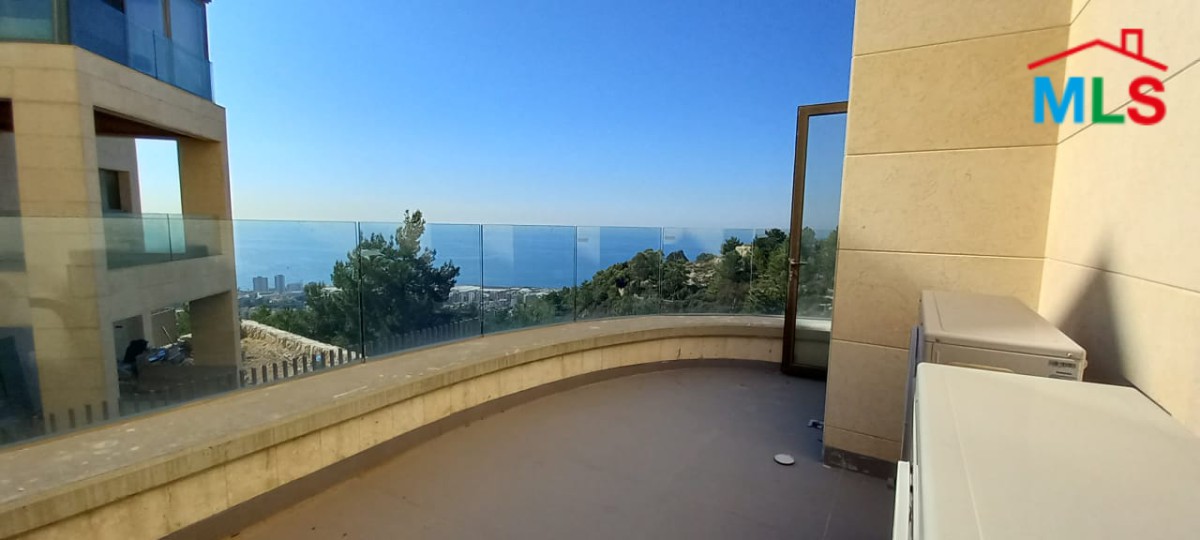 A Deluxe Apartment for Rent in Adma with Garden and Open Sea View