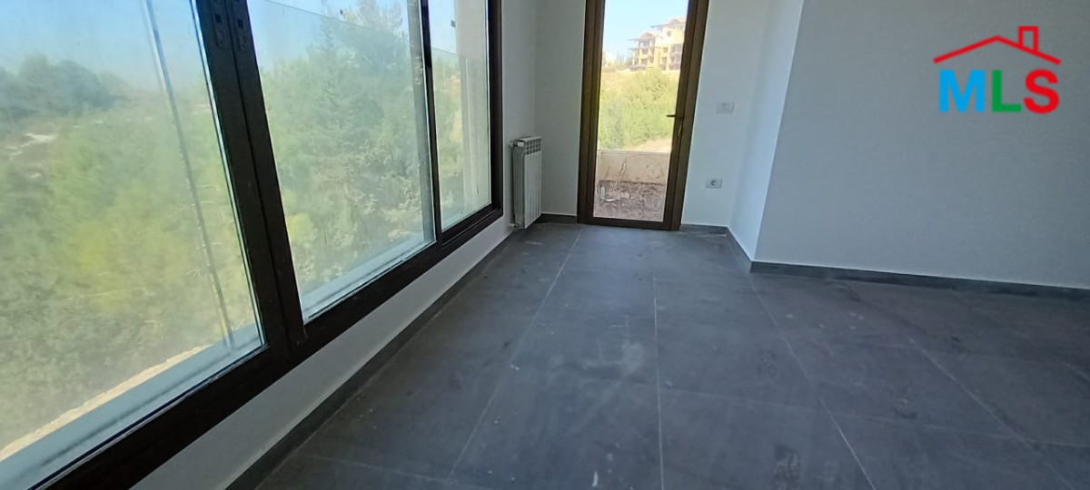 A Deluxe Apartment for Rent in Adma with Garden and Open Sea View