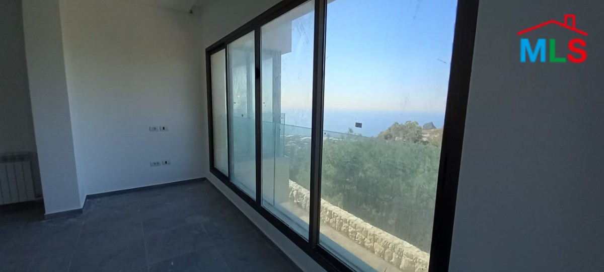 A Deluxe Apartment for Rent in Adma with Garden and Open Sea View